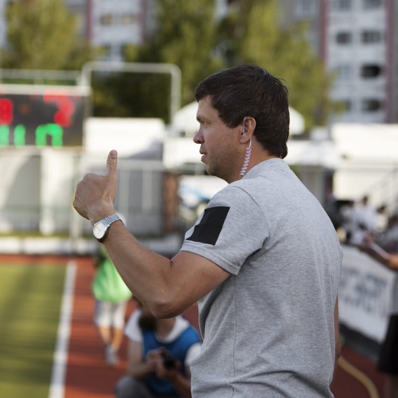 male-field-hockey-coach-arena